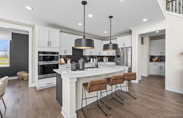 51451 Green Meadows Drive, Macomb, MI 48042