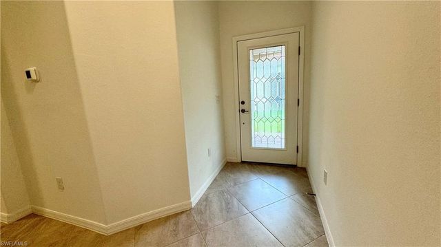 2066 Tamarron LN, Naples, FL 34120