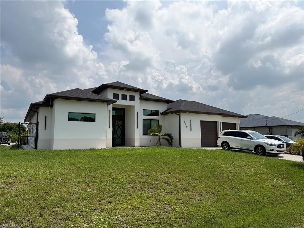 910 VENICE AVE N, LEHIGH ACRES, FL 33971 — photo 2
