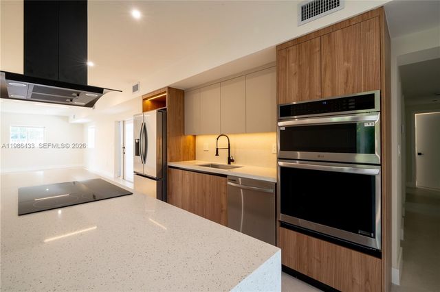 323 NW 104th Ter, Miami, FL 33150