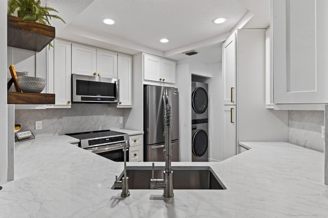 701 MUIRFIELD Court 701E, Jupiter, FL 33458