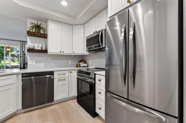 701 MUIRFIELD Court 701E, Jupiter, FL 33458