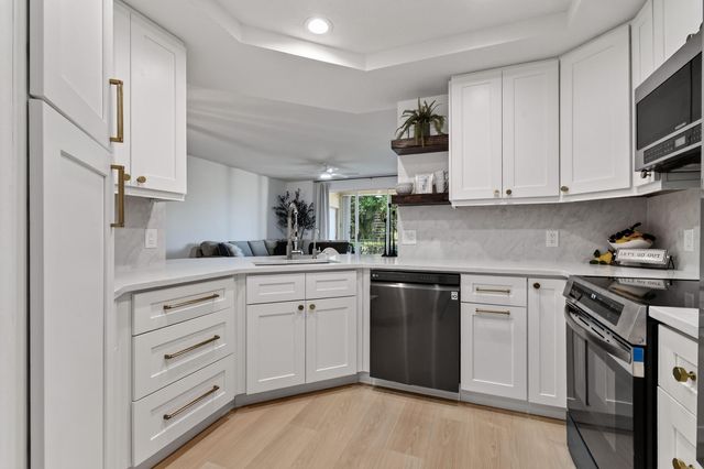 701 MUIRFIELD Court 701E, Jupiter, FL 33458