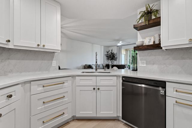 701 MUIRFIELD Court 701E, Jupiter, FL 33458