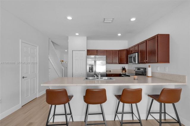 9393 W 33rd Way, Hialeah, FL 33018