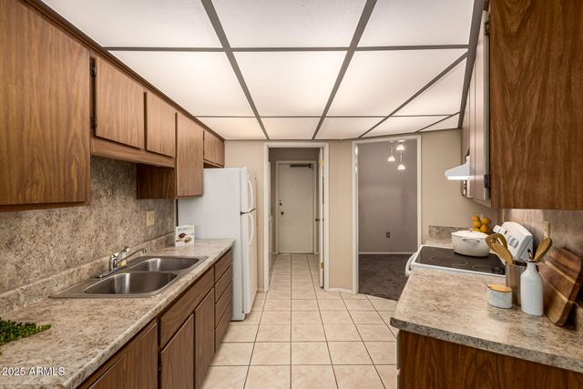 10913 W COGGINS Drive, Sun City, AZ 85351