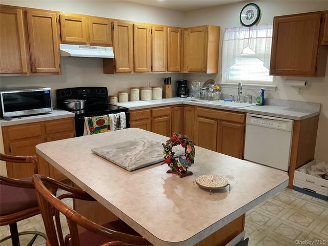 409 Village Circle N, Manorville, NY 11949