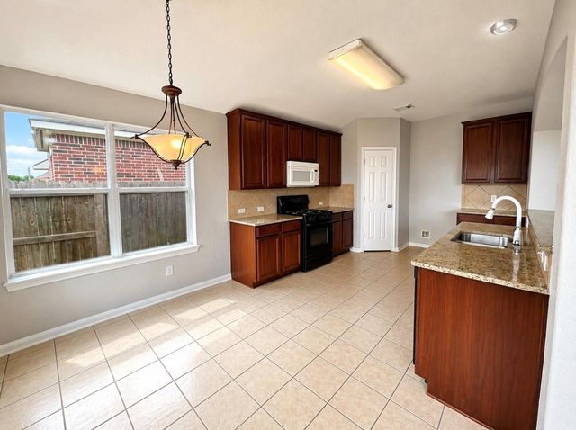 810 Hollyhock Drive, Stafford, TX 77477