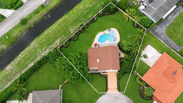 6785 ESCONDIDA Drive, Lake Clarke Shores, FL 33406
