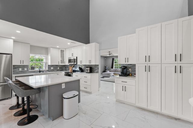 6785 ESCONDIDA Drive, Lake Clarke Shores, FL 33406