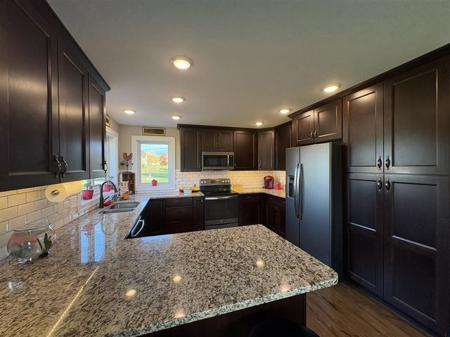 9277 Ivanrest Avenue, Byron Center, MI 49315