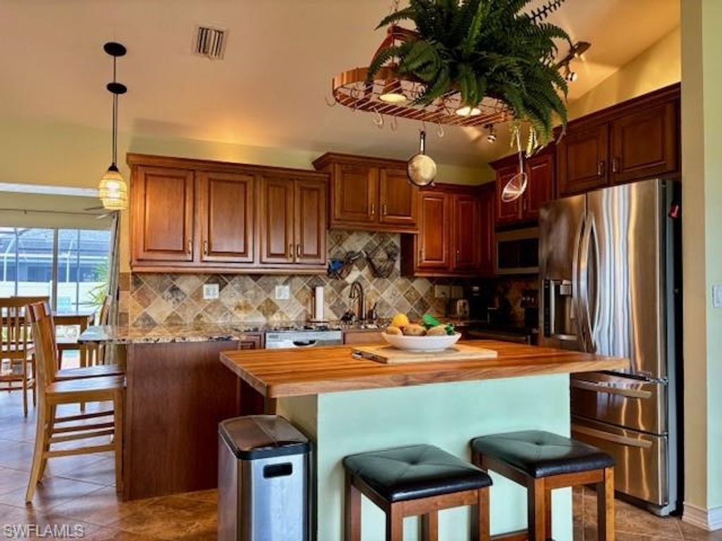 Image 3 of property listing at 1155 SW 43rd ST, Cape Coral, FL 33914