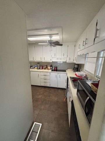 6445 Cypress Lane, Atlantis, FL 33462