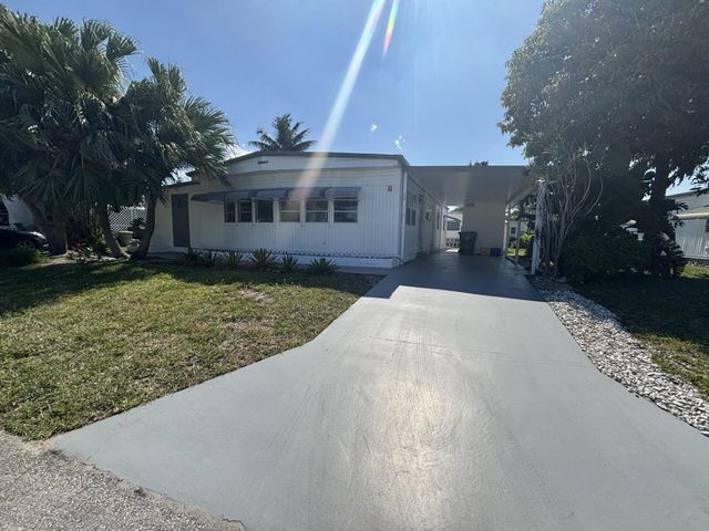 6445 Cypress Lane, Atlantis, FL 33462