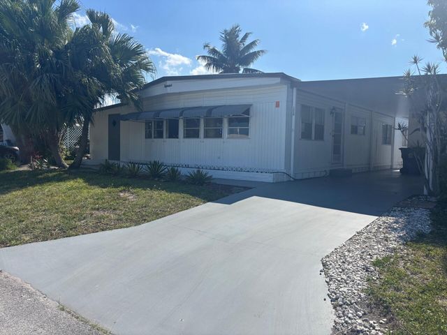 6445 Cypress Lane, Atlantis, FL 33462