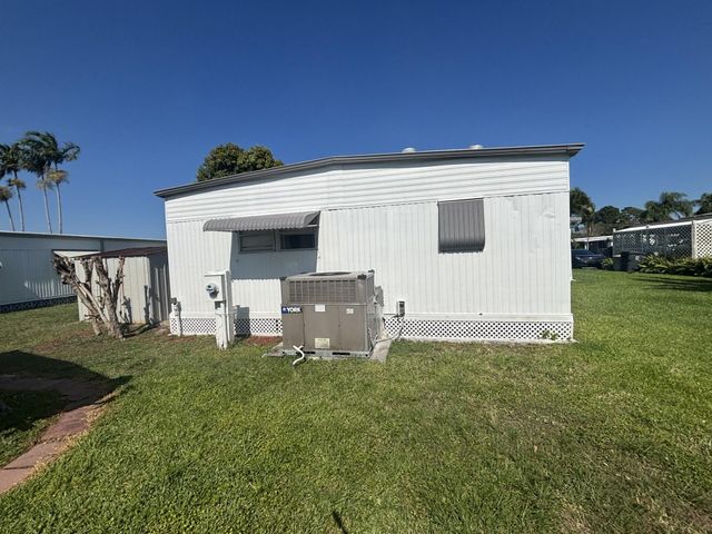 6445 Cypress Lane, Atlantis, FL 33462