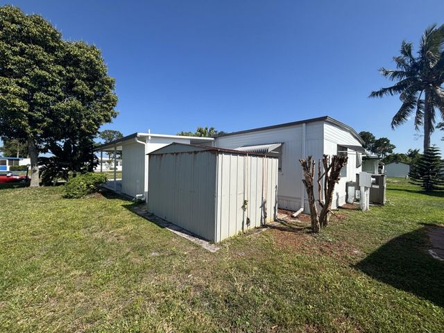 6445 Cypress Lane, Atlantis, FL 33462