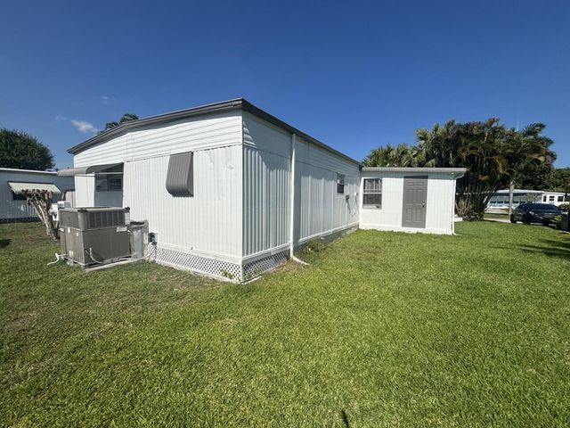 6445 Cypress Lane, Atlantis, FL 33462