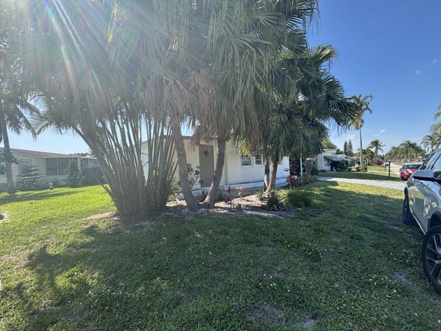 6445 Cypress Lane, Atlantis, FL 33462