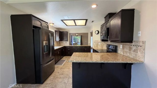 1145 E Woodhaven Lane, Fresno, CA 93720