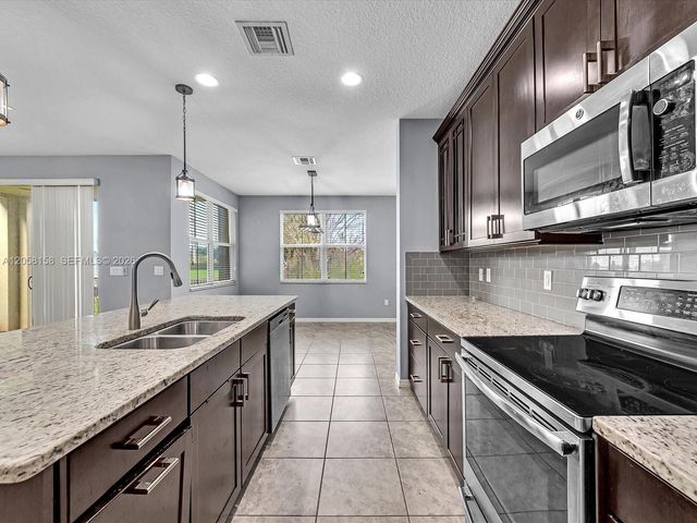 6447 Osprey Landing St, Davie, FL 33314