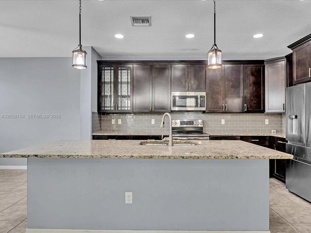 6447 Osprey Landing St, Davie, FL 33314