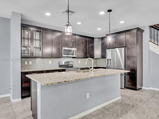 6447 Osprey Landing St, Davie, FL 33314