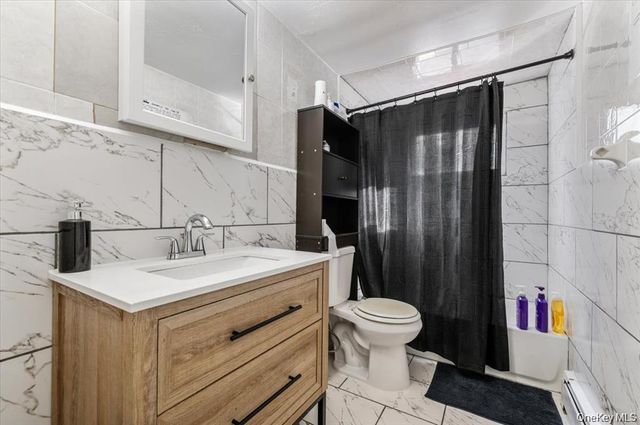 22 Hudson Place, Hempstead, NY 11550