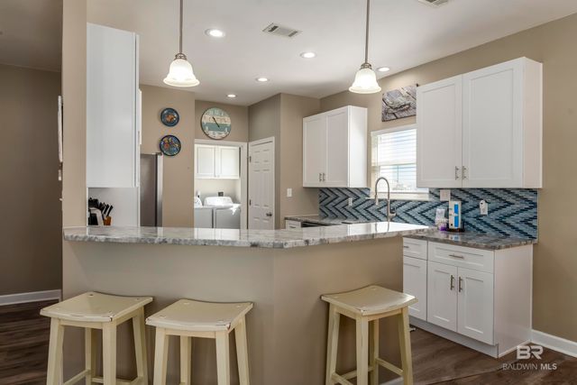 105 STRAND Court, Dauphin Island, AL 36528