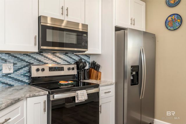 105 STRAND Court, Dauphin Island, AL 36528