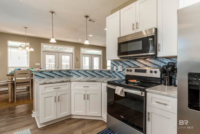 105 STRAND Court, Dauphin Island, AL 36528