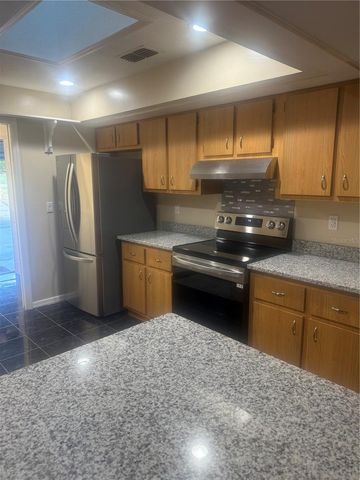 8741 VILLAGE GREEN BOULEVARD, Clermont, FL 34711