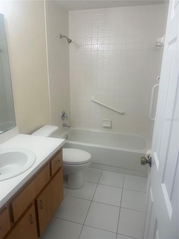 8741 VILLAGE GREEN BOULEVARD, Clermont, FL 34711