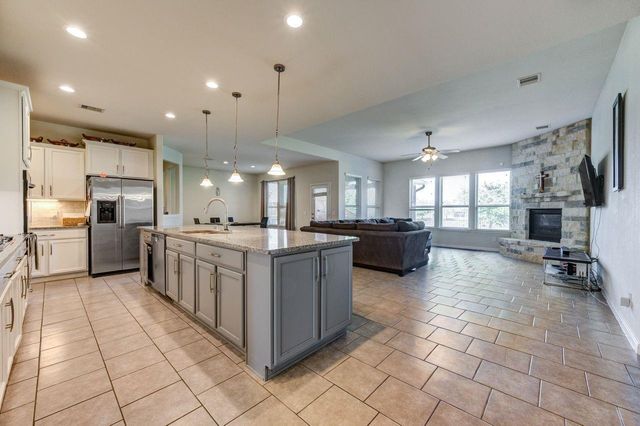 24506 Raven Cliff Falls Drive, Tomball, TX 77375