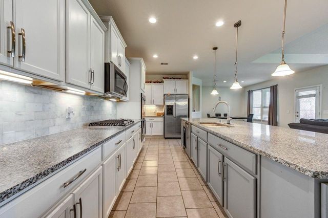 24506 Raven Cliff Falls Drive, Tomball, TX 77375