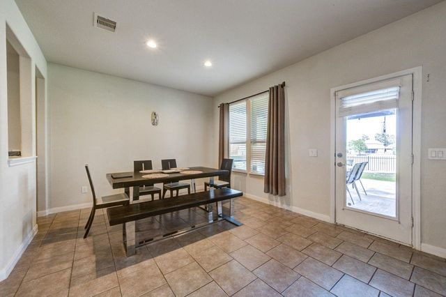 24506 Raven Cliff Falls Drive, Tomball, TX 77375