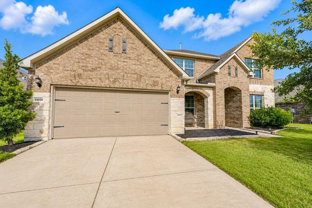 24506 Raven Cliff Falls Drive, Tomball, TX 77375