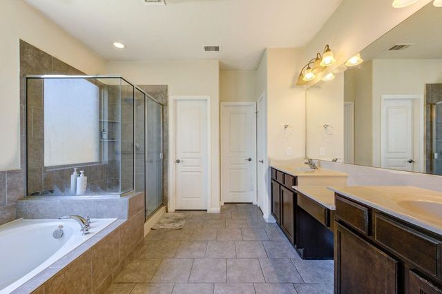24506 Raven Cliff Falls Drive, Tomball, TX 77375