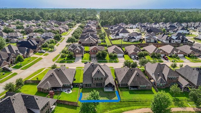 24506 Raven Cliff Falls Drive, Tomball, TX 77375