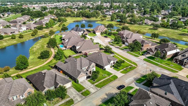 24506 Raven Cliff Falls Drive, Tomball, TX 77375