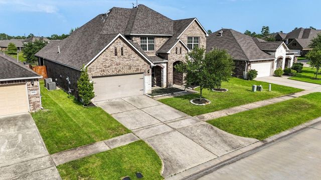 24506 Raven Cliff Falls Drive, Tomball, TX 77375