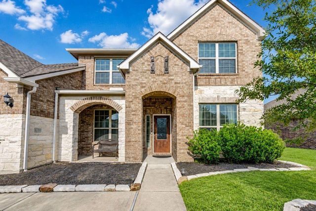 24506 Raven Cliff Falls Drive, Tomball, TX 77375