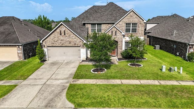 24506 Raven Cliff Falls Drive, Tomball, TX 77375