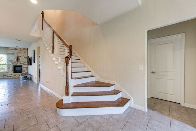 24506 Raven Cliff Falls Drive, Tomball, TX 77375