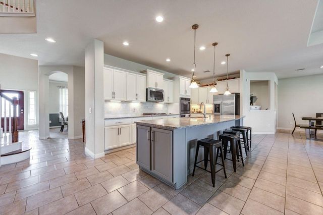 24506 Raven Cliff Falls Drive, Tomball, TX 77375
