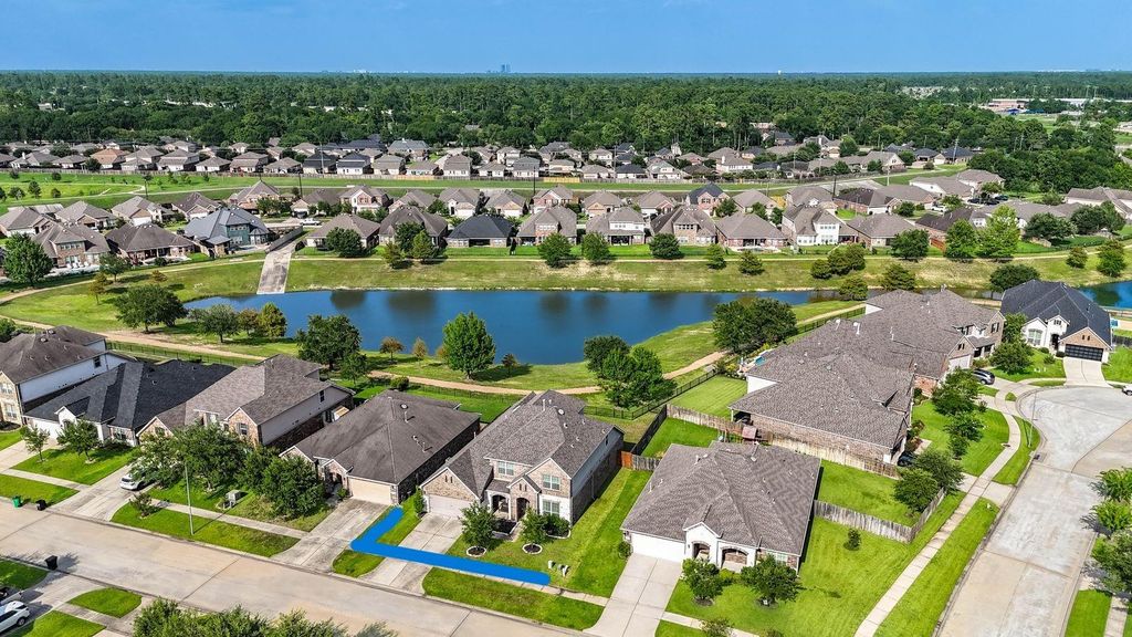 24506 Raven Cliff Falls Drive, Tomball, TX 77375