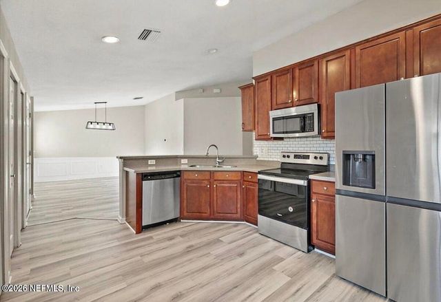 6607 WHITE BLOSSOM Court 11D, Jacksonville, FL 32258
