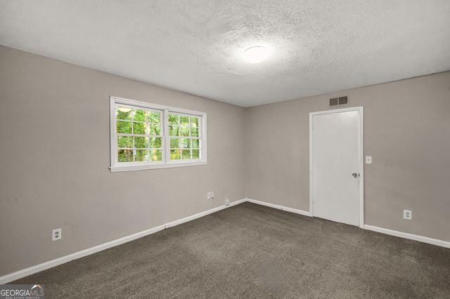 298 W Wind Drive SW, Lilburn, GA 30047