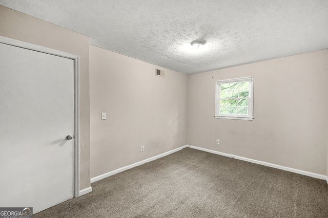 298 W Wind Drive SW, Lilburn, GA 30047