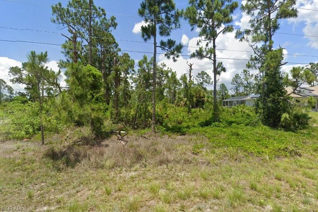 750 Chelsea AVE S, LEHIGH ACRES, FL 33974 — exterior